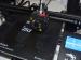 Impresora 3D creando una imagen diseñada en el taller